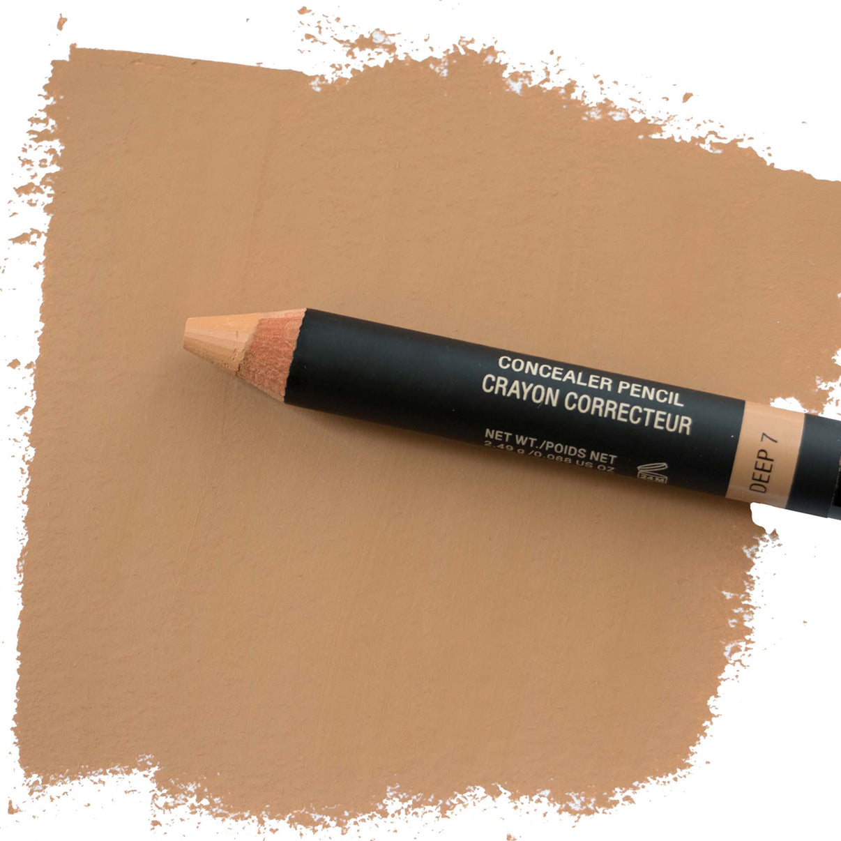 Concealer pencil in shade deep 7 flat lay with texture swatch