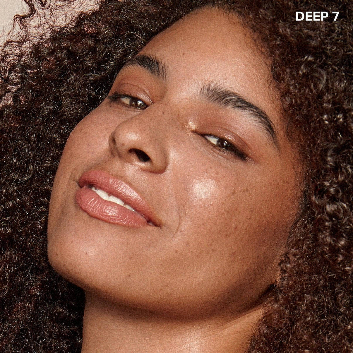 model wearing Concealer pencil in shade deep 7