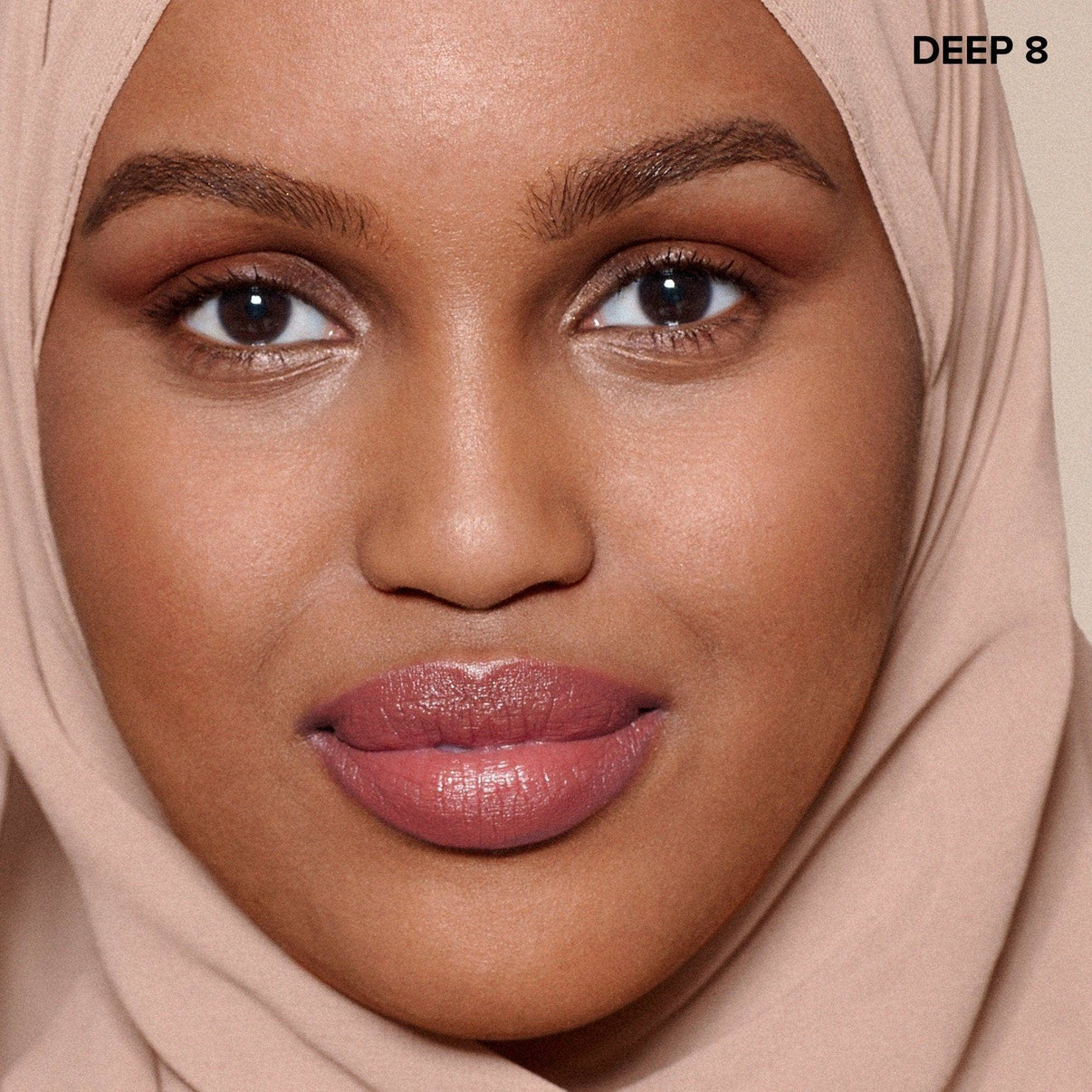 model wearing Concealer pencil in shade deep 8