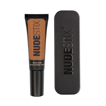 Tinted Cover Liquid Foundation in shade nude 8 with Nudestix can